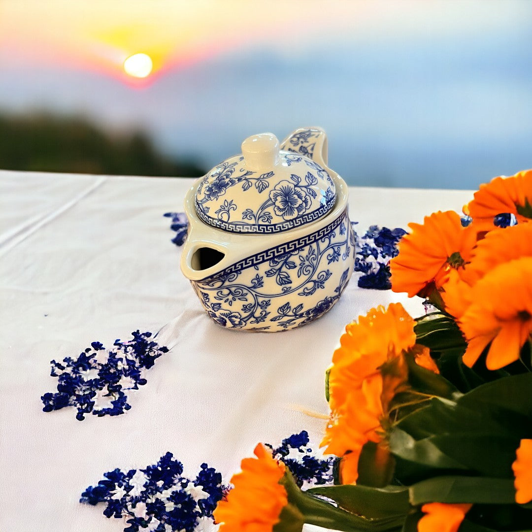 Ceramic tea pot with removable infuser