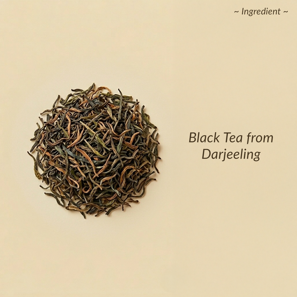 Black tea leaves from Darjeeling on a beige background with text.