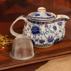 Elegant ceramic teapot with stainless steel infuser for tea brewing